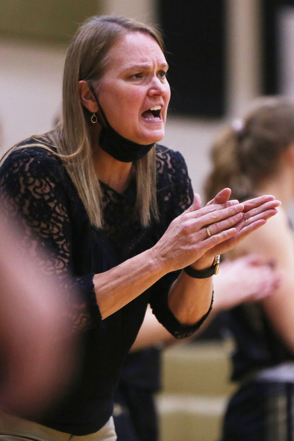 Michelle Dahlberg yells and claps after Buffalo scored